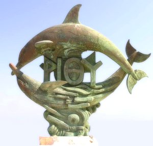 the crest of the town with two dolphins in a circle the crest of the town with two dolphins in a circle